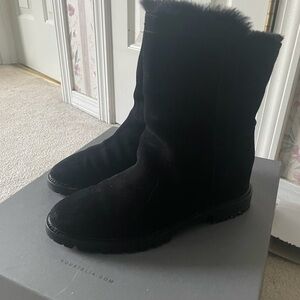 Aquatalia suede boots with hidden 1” platform and shearling lining.
Hardly worn.